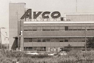 Exterior of Avco-Lycoming building with neon Avco sign